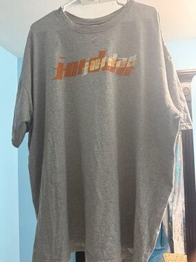Jordan Gray and Burnt orange basketball shirt. Gently used size xxl. No damage.